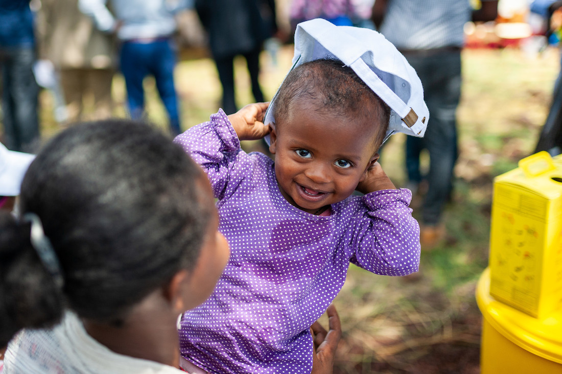 A child smiling during the introduction of the second dose of measles vaccination in Ethiopia. Credit: Gavi/2019/Frederique Tissandier.